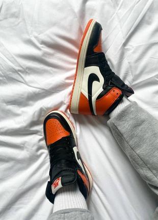 Кроссовки nike air jordan 1 retro orange black4 фото