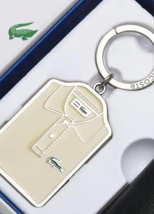 Подарочный набор lacoste мужской кошелек + брелок черный портмоне7 фото