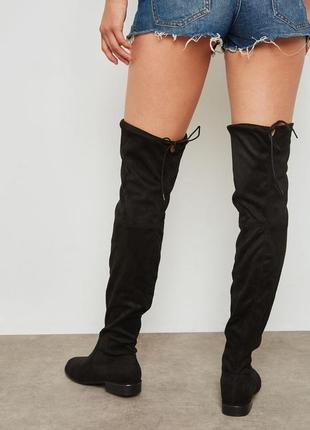Черные замшевые высокие деми сапоги за колено на низком каблуке ботфорты сапожки со шнуровкой1 фото