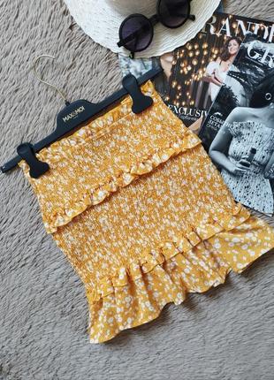 Классная короткая юбка -резинка с рюшами1 фото