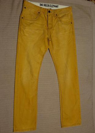 Ефектні х/б джинси -варенки кольору охри з потертостями one green elephant німеччина