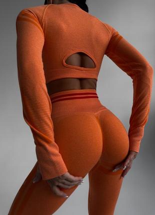 Безшовний жіночий костюм для спорту та фітнесу sport помаранчевий (рашгард, легінси)