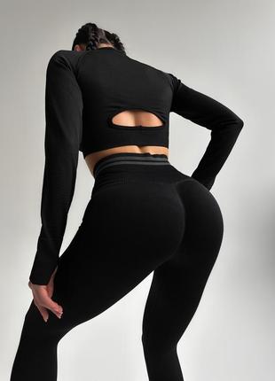 Бесшовный женский костюм для спорта и фитнеса sport черный (рашгард, леггинсы)1 фото
