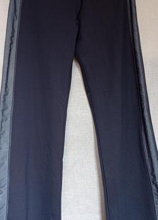 Широкие спортивные брюки по типу "палаццо" с лампасами4 фото