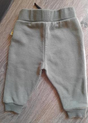 Теплые брюки на малыша 6-9 месяцев2 фото