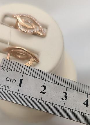 Золоті сережки на англійському замку 585 проби з вставкою цирконію золоті сережки з фіанітами3 фото