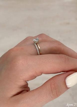 Серебряное двойное кольцо с золотыми накладками и камнем3 фото