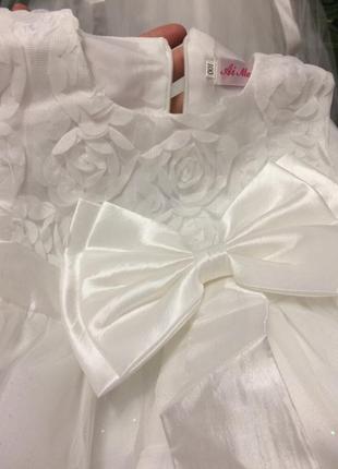 Белое платье с бантом на девочку нарядное на свадьбу4 фото
