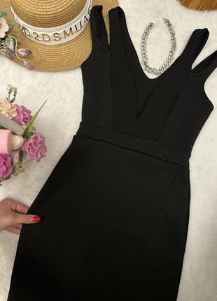 Черное вечернее платье оригинального дизайна6 фото
