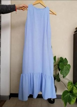 Небесно-блакитна сукня міді з воланом