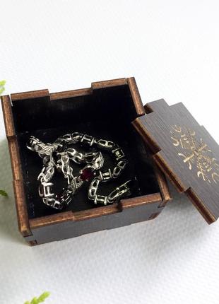 Маленька дерев'яна коробочка із захисним символом7 фото