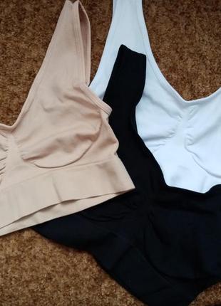 Женский топ. top-sin costuras.