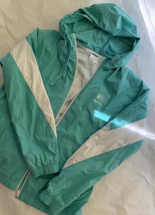 Жіноча вітрівка reebok classic f windbreaker w dm5369 бірюзового кольору, розмір s