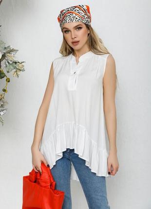 Молочна асиметрична блуза без рукавів з воланом