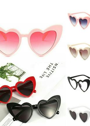 Жіночі сонцезахисні окуляри у формі серця червоний прозорий3 фото