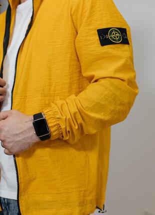 Чоловіча вітровка stone island1 фото