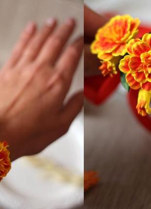 Оранжевый браслет на руку с цветами в украинском стиле "чорнобривцы" браслет веточка2 фото