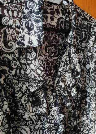 Блуза з воланом next