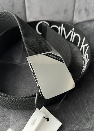 Мужской ремень calvin klein из ткани1 фото