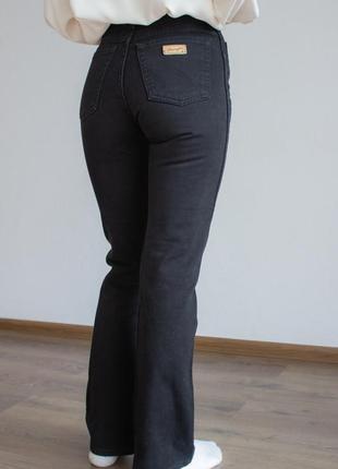 Черные джинсы модель flared с высокой талией2 фото