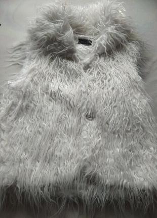 Жилетки довгі з хутром