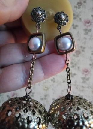 Этно восточний бохо стиль сережки великі ажурні металеві намистини антична бронза з перлиною в рамочці3 фото