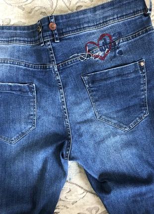 Розкішні брендові джинси,34 р3 фото