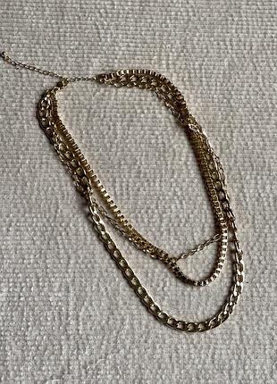 Золоте кольє з трьох ланцюжків