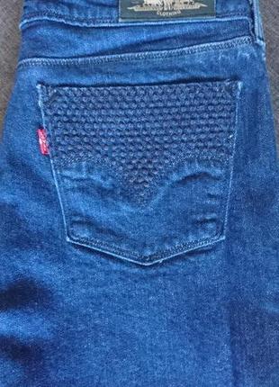 Джинси levis з розшитими кишенями