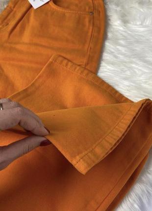 Новые яркие неоновые оранжевые джинсы прямые с потертостями на коленях мом6 фото
