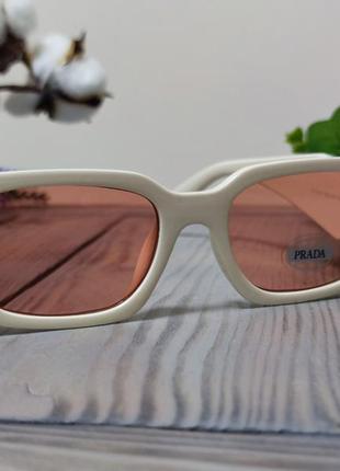 Сонцезахисні окуляри prada9 фото