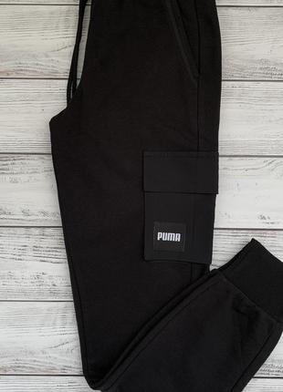 Чоловічі спортивні штани на манжетах від бренду puma оригінал3 фото