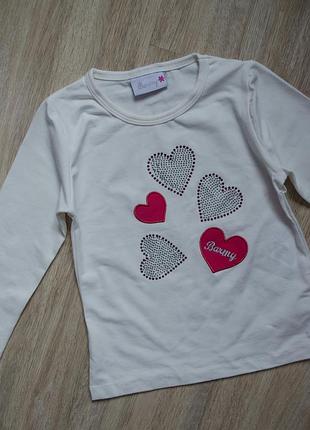 Фірмовий реглан з довгим рукавом в сердечка