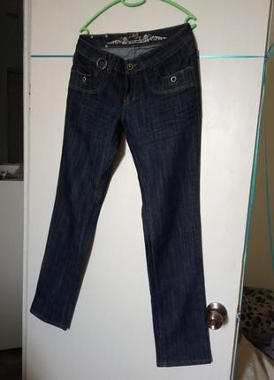 Жіночі джинси прямі широкі середня посадка