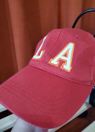 Кепка la