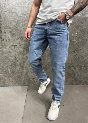 Мужские джинсы голубого цвета1 фото