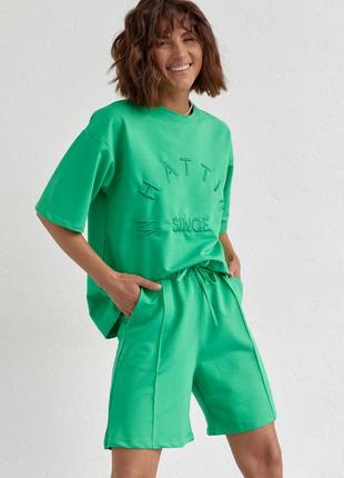 Трикотажный женский костюм с шортами и футболкой с вышивкой5 фото