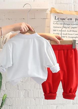 Костюм детский модный трикотажный белая кофта свитшот красные брюки брендовый стильный модный 2023 весенний3 фото