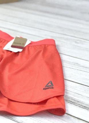 Спортивные шорты reebok кораллового цвета3 фото
