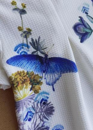 Белое фактурное платье на 6-9 месяцев в цветочный принт, синие цветы3 фото