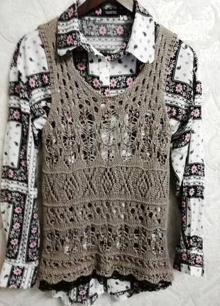 Ажурная, связанная крючком жилетка