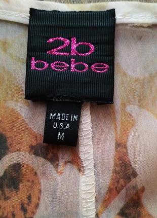 2be/ bebe u.s.a. оригинал воздушная асимметричная блуза свободного кроя c прорезями на плечах5 фото