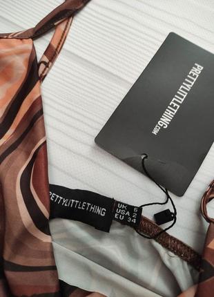 Плаття в принт по фігурі зі зборками