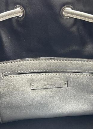 Вместительная стильная практичная сумка мешочек в стиле michael kors4 фото