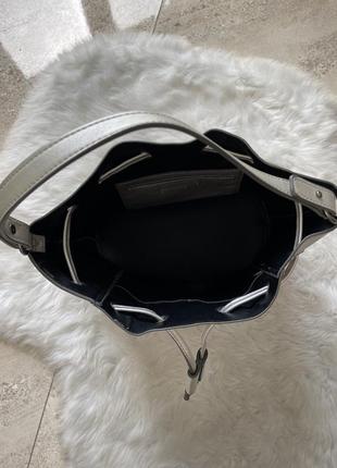 Вместительная стильная практичная сумка мешочек в стиле michael kors3 фото