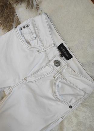 Білі джинси скіні з рваностями від river island1 фото