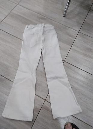 Джинсовые брюки клеш от бренда манго джинсы стрейч2 фото