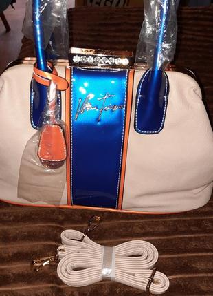 Очень шикарная женская сумочка "поцелуйчик" бренда velina fabbiano3 фото