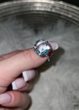 Кольцо со светло-голубым камнем.2 фото
