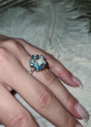 Кольцо со светло-голубым камнем.4 фото